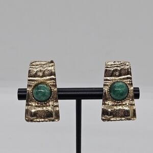 Reinad gold tone textured clip on earrings with green cabochons